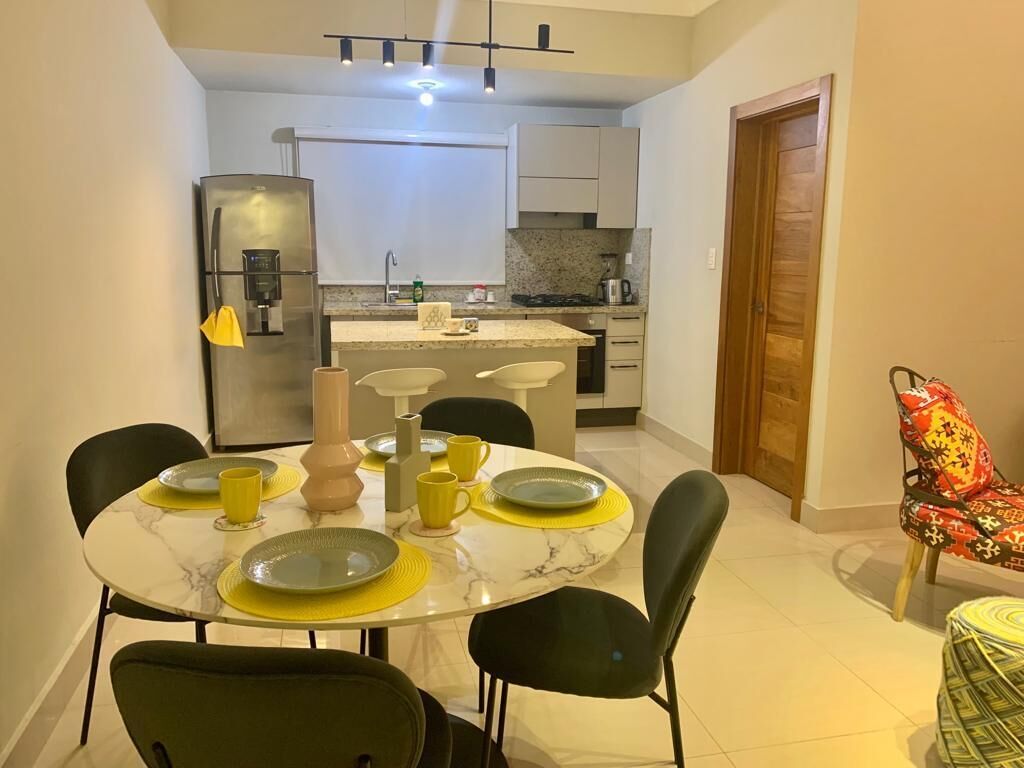 Fridge, microwave, coffee/tea maker, cookware/dishes/utensils