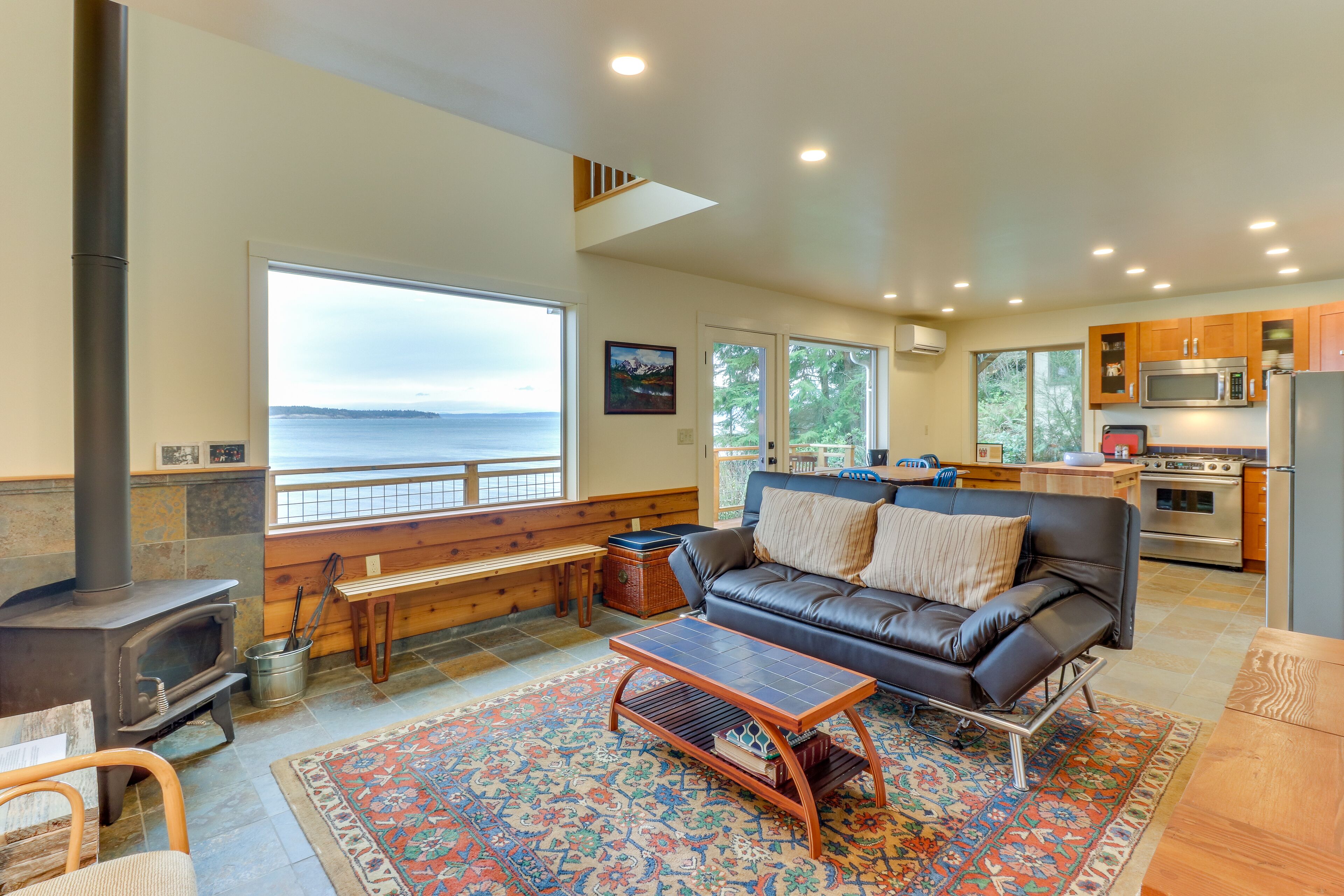 Bayfront home on Oak Bay with fireplace, beachfront, & outdoor dining