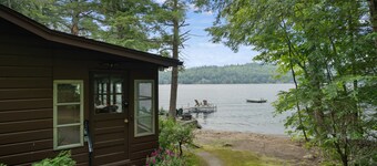 Lakefront house with dock, sandy beach, full kitchen, gorgeous views