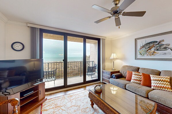 TV, books, stereo - A Relaxing Getaway with Shared Pools and Hot Tub in an Oceanfront Villa (Hilton Head)