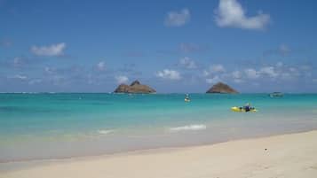 Na praia, toalhas de praia