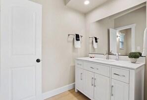 Combined shower/bathtub, hair dryer, towels, soap