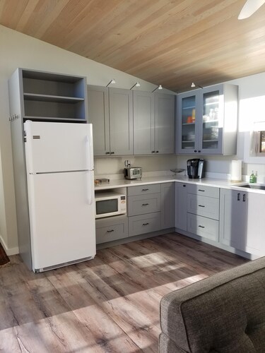 Spectacular West side views of Strait, Olympics, Victoria, south to Mt Rainier.
