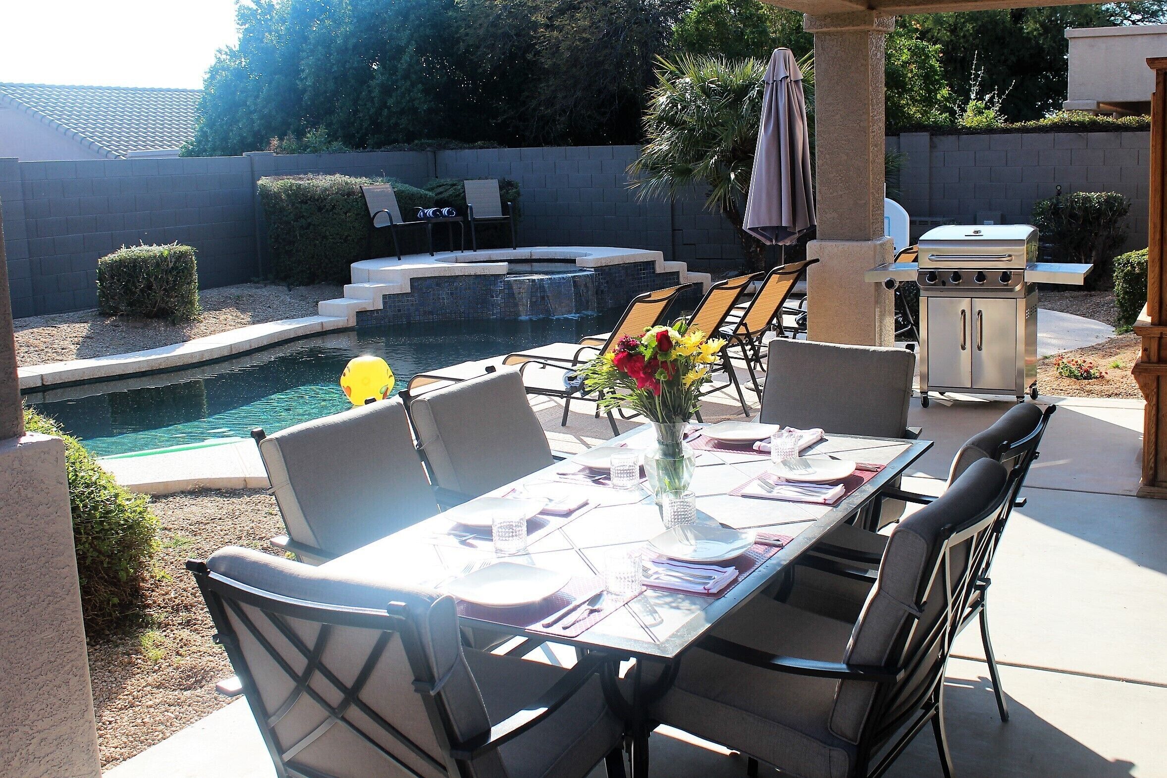 Large Patio table, Lots of Lounge Chairs, New Stainless Steel barbecue