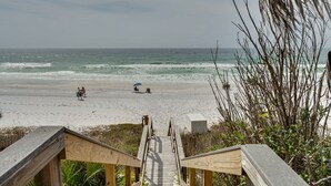 A wooden staircase leading to a beach with a view of the ocean. - 500 Ft from Beach! 3 Pools (1 Seasonally Heated)! Ground Floor Condo! ~ Cabana 103 at Gulf Place on 30A (Santa Rosa Beach)