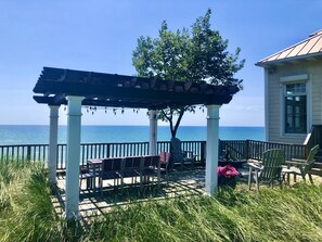 Outdoor dining - Amazing Lake Michigan Waterfront Custom Home With 186’ Of Perfect Sandy Beach!! (Montague)