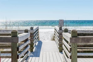 A wooden boardwalk leading to a beach with clear blue water. - Golf Cart & 4 Bikes! Walk to the Beach & the Pool! One Story Home in Gated Comm! ~ Our Little Peace of Paradise at Destiny West (Destin)