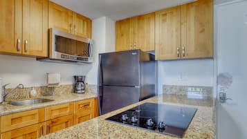 Fridge, microwave, stovetop, coffee/tea maker