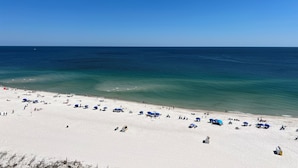 A beach with white sand and clear blue water. - Gulf-Front Phoenix X 3BR  Stunning Balcony Views,  (Orange Beach)