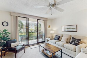 TV, DVD player - Bright Condo with Full Kitchen, Shared Pools, Hot Tub, Beach Access, and More (Hilton Head)