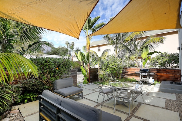 Take in the gorgeous landscaping and expansive backyard on your own private patio with BBQ