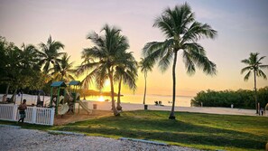 On the beach, sun loungers, beach towels