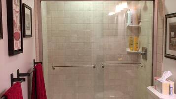 Combined shower/tub, hair dryer, towels, soap