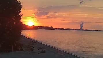 On the beach, sun loungers