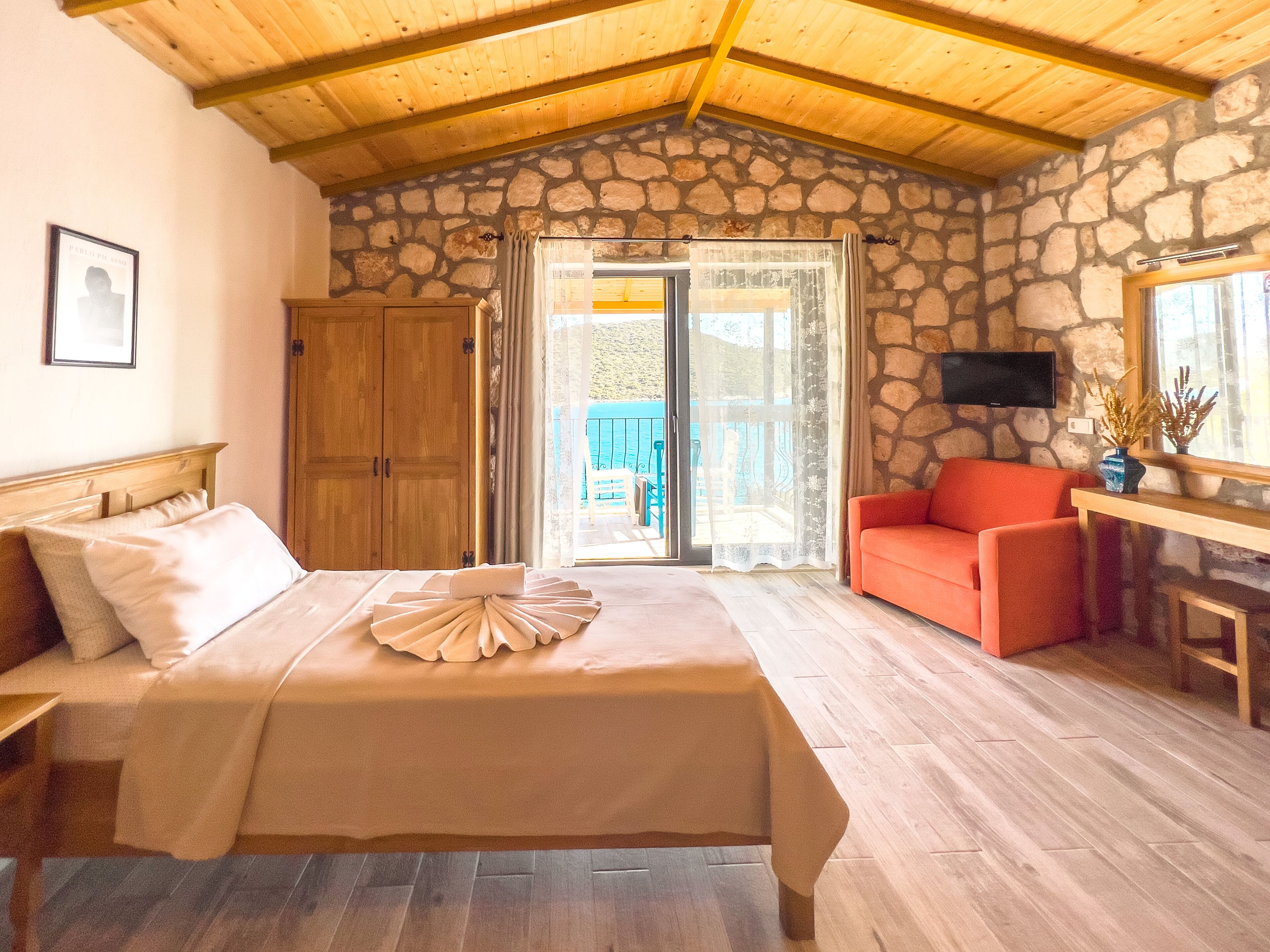 family room, sea view | 1 bedroom, minibar, desk, blackout curtains