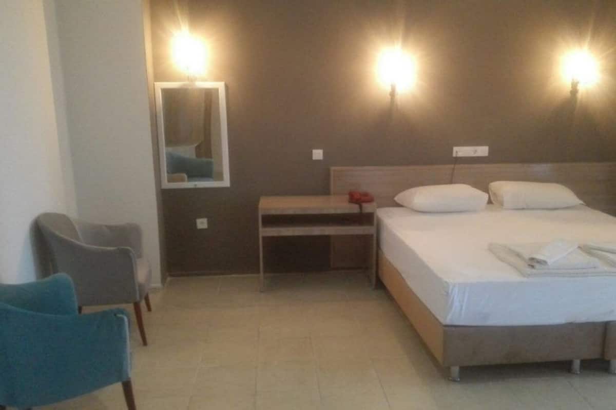 Select Comfort beds, desk, laptop workspace, iron/ironing board