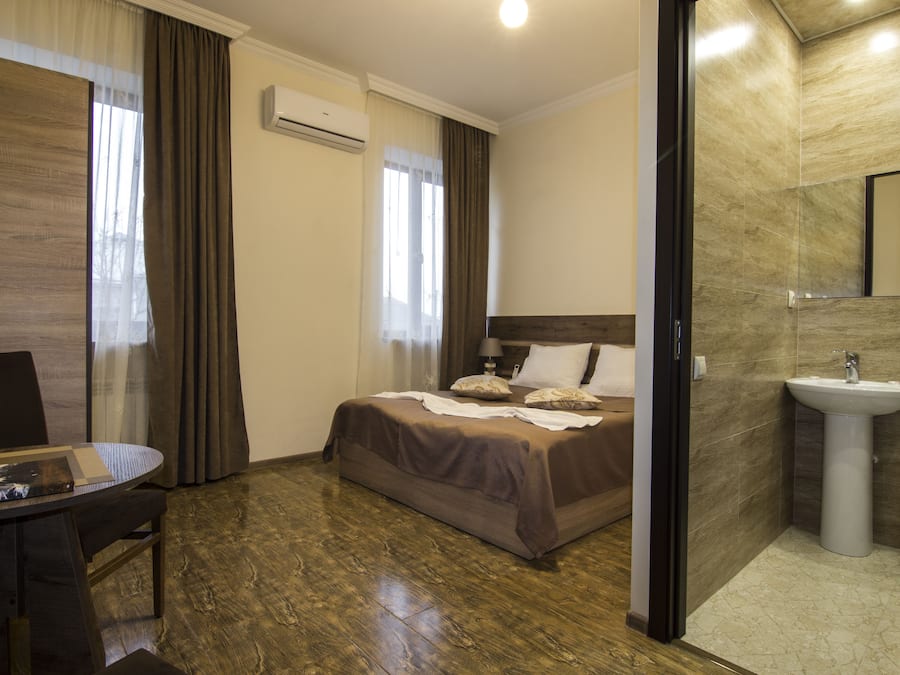 Quarto casal ou duplo conforto, vista para o jardim | Comodidades do quarto