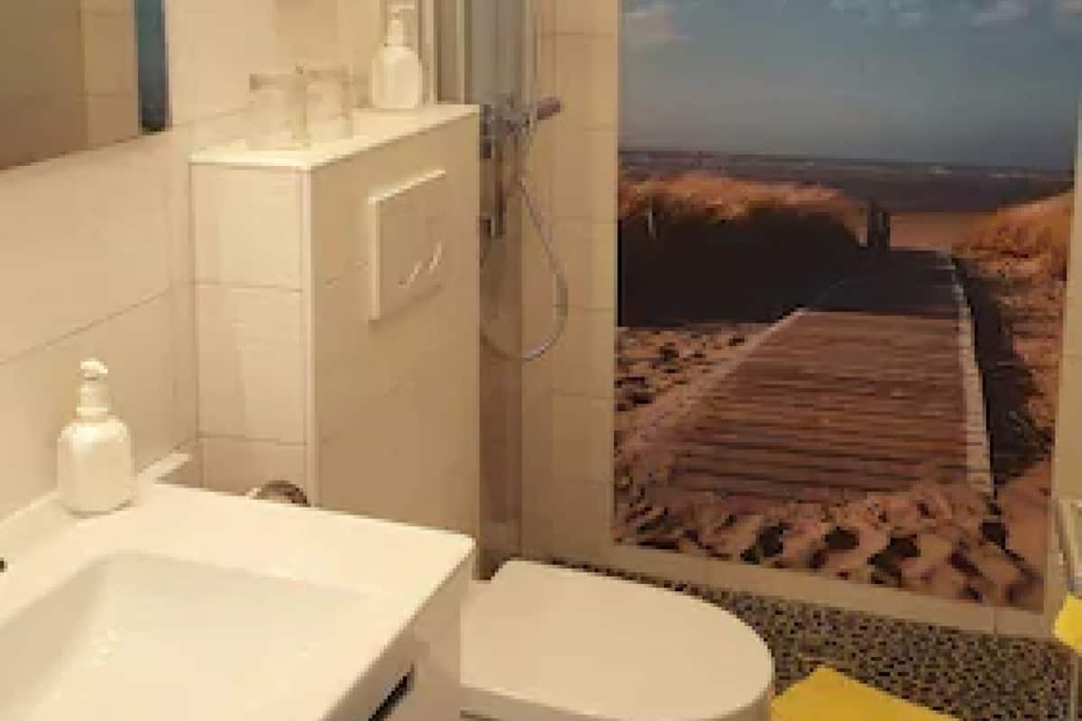 classic double room | bathroom | hair dryer, towels, soap, shampoo