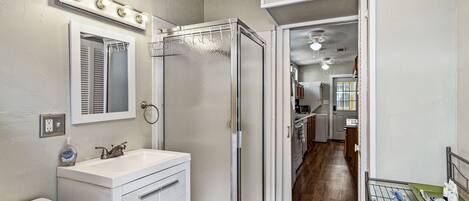 Shower, hair dryer, towels, soap