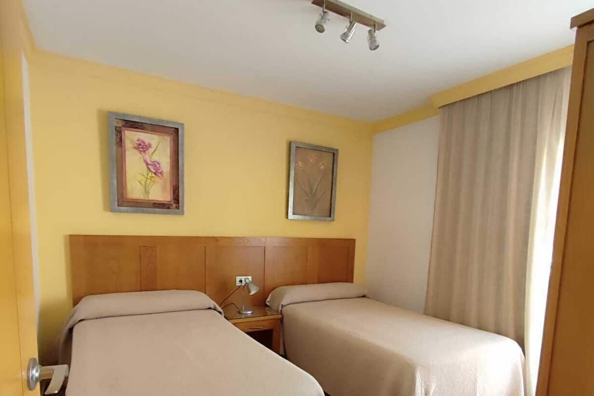 1 bedroom, laptop workspace, blackout drapes, soundproofing