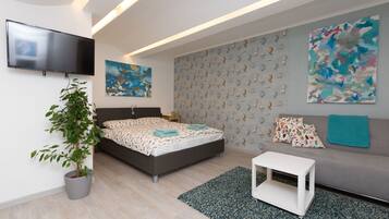 Standard Apartment | Desk, blackout drapes, soundproofing, iron/ironing board