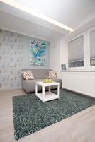 Standard Apartment | Living room | Flat-screen TV