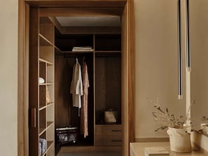 Combined shower/tub, designer toiletries, hair dryer, bathrobes