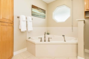 Bathtub, hair dryer, towels