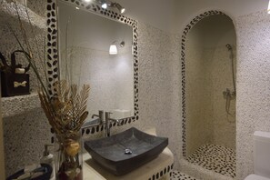 Shower, hair dryer, towels, toilet paper