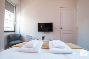 1 chambre, fer et planche Ă repasser, Wi-Fi, draps fournis