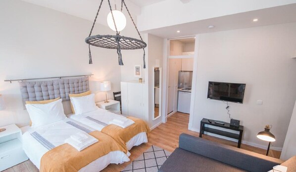 1 habitación, tabla de planchar con plancha, wifi y ropa de cama 