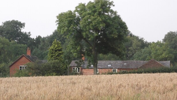 A rural landscape with a house surrounded by a field of crops. - Farmhouse Cottage Sleeps 2 (1 en-suite Bedroom) (Congleton)