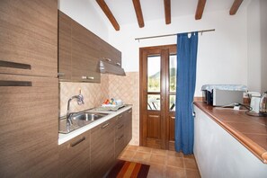 Fridge, microwave, oven, cookware/dishes/utensils