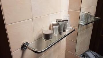 Hair dryer, towels, soap, shampoo