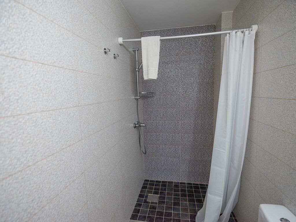 Combined shower/tub, hair dryer, towels, soap