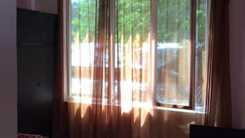 Basic Triple Room, Multiple Beds, Non Smoking | Free cots/infant beds, free WiFi, bed sheets