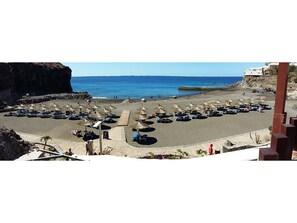 Perto da praia, toalhas de praia 