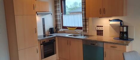 Fridge, oven, dishwasher, coffee/tea maker