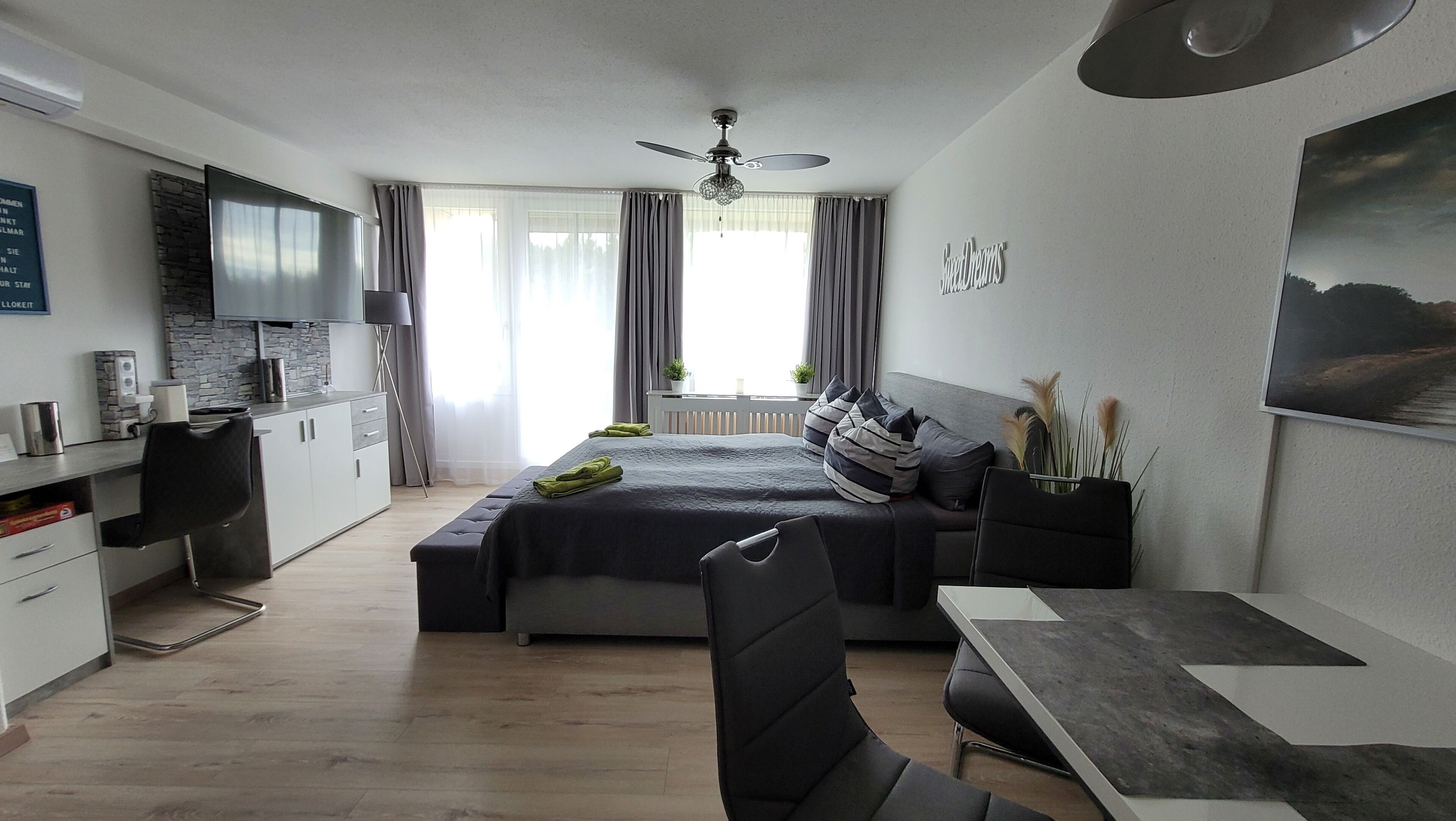 1 bedroom, desk, iron/ironing board, travel crib