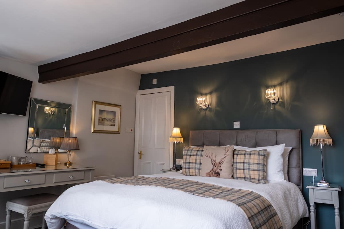 Desk, blackout curtains, free WiFi, bed sheets