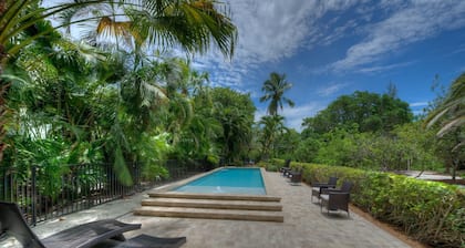 Waterfront Pink House with Private Dock & Pool!