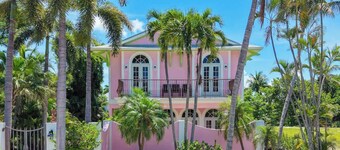 Waterfront Pink House with Private Dock & Pool!