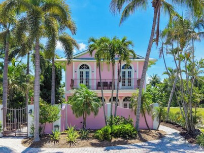 Waterfront Pink House with Private Dock & Pool!
