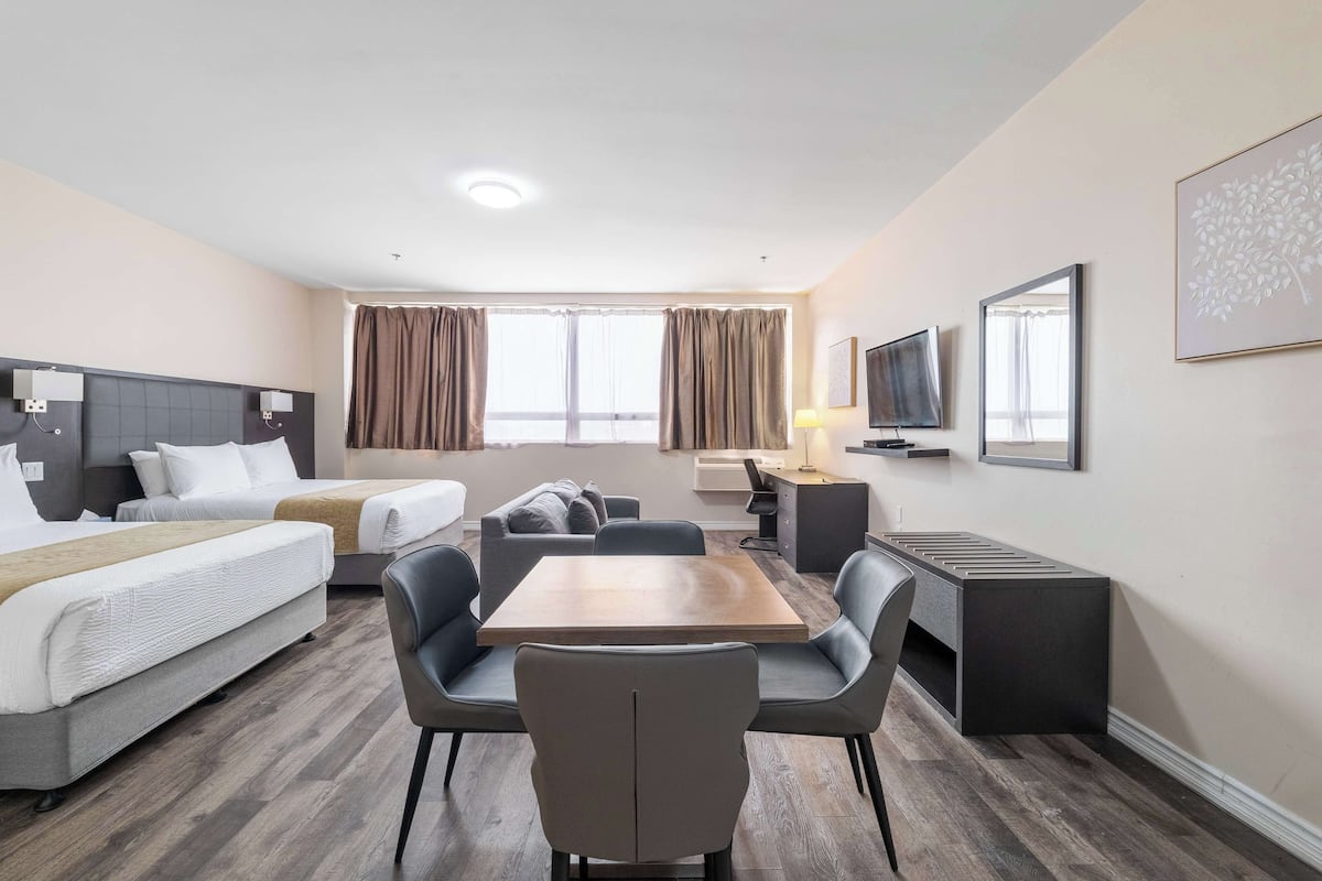 Suite, 2 Queen Beds, Non Smoking, Kitchen (Larger Room;with Sofabed) | Desk, laptop workspace, iron/ironing board, free WiFi