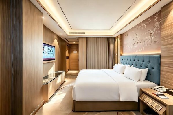 A modern hotel room with a large bed, a TV mounted on the wall, and a wooden panel design. - Oriental Paris Business Hotel (Shishi)