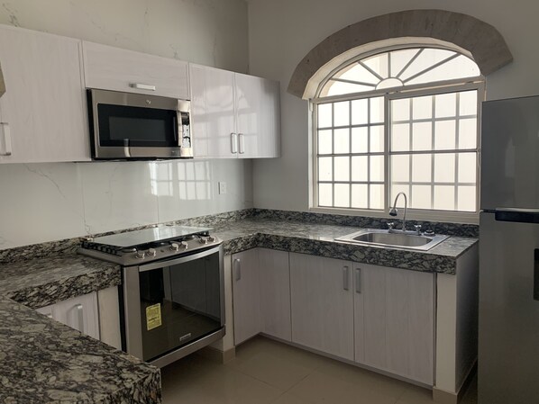 Fridge, microwave, oven, stovetop