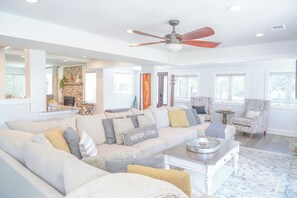 Smart TV, fireplace, table football, books