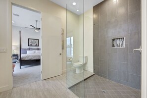 Combined shower/bathtub, hair dryer, towels, soap