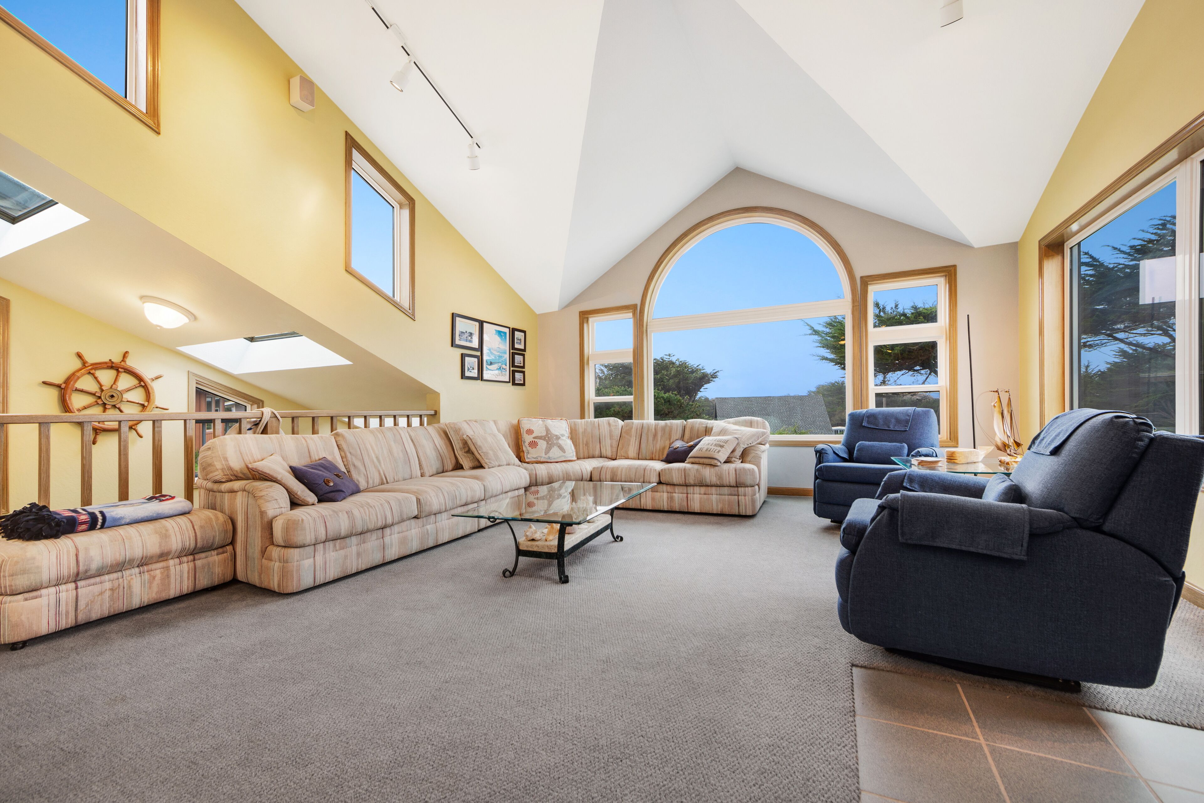 Ocean view home with private sauna, fireplace, balcony & W/D - walk to beach