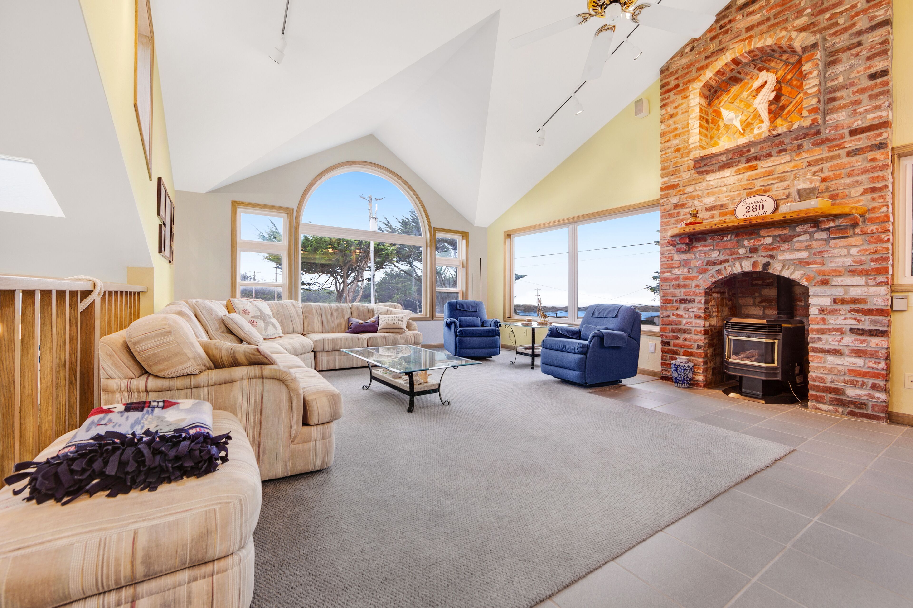 Ocean view home with private sauna, fireplace, balcony & W/D - walk to beach